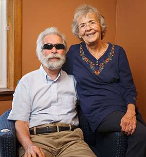 The Kleins sitting together, smiling - image