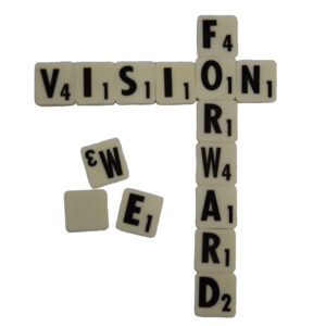 Scrabble tiles spelling Vision Forward.