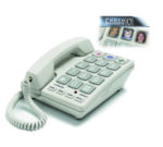Braille phone from an angle. Behind it is an enlarged image of the photo buttons.