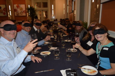 Photo of guests at past Dining in the Dark event.