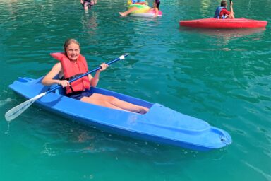 Youth in a kayak.