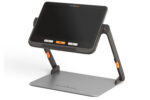 The Explore 12 sits in its stand with its screen off.