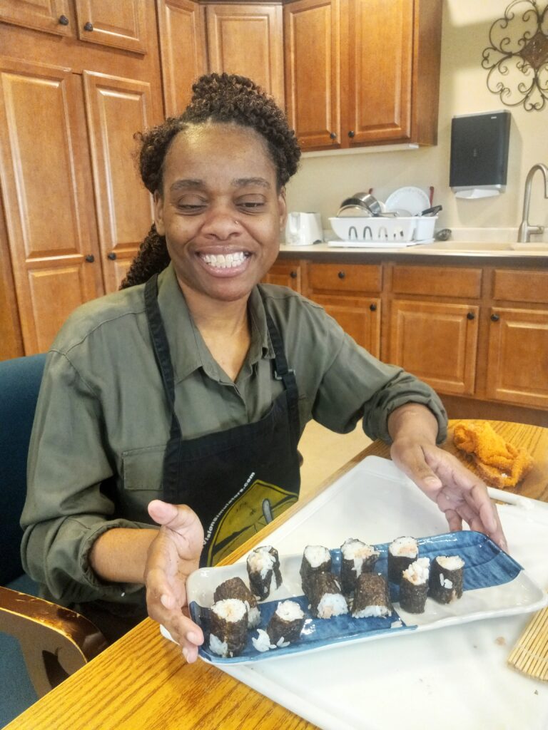 blind woman with sushi she made