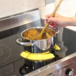 Holds pots in place