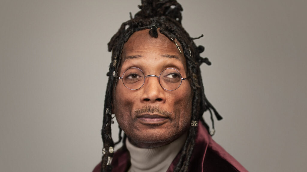 A man's headshot shown with glasses on
